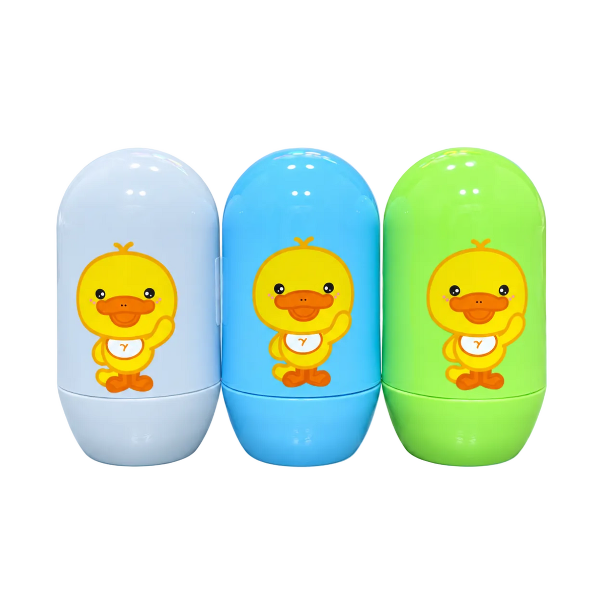 Three capsule-shaped baby bottles in white, blue, and green, each featuring a cartoon yellow duck holding a bib with the number 7, set against a solid light blue background.