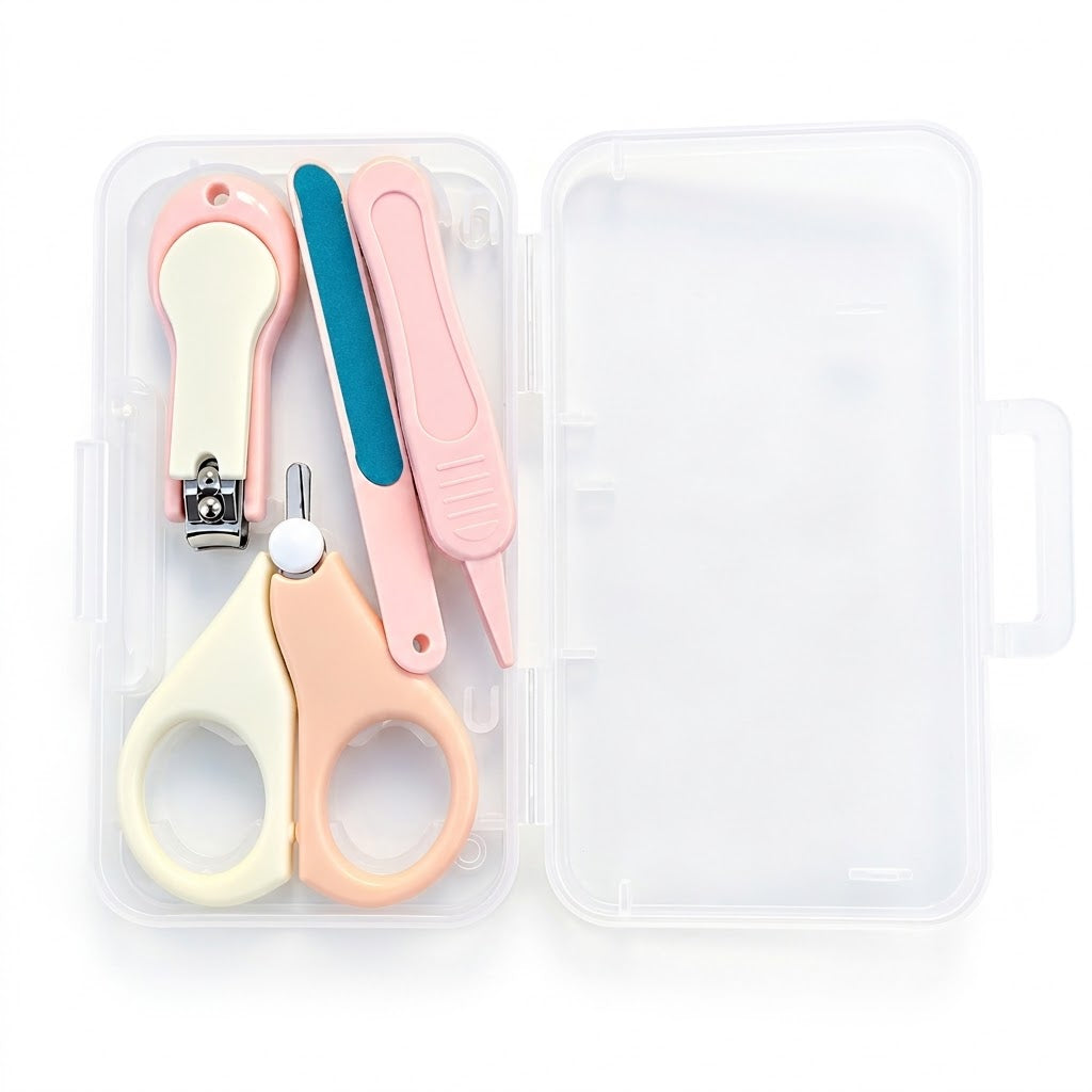 A nail care set in a clear plastic case, including pastel pink and cream nail scissors, a nail clipper, and a nail file with a blue accent, on a white background.