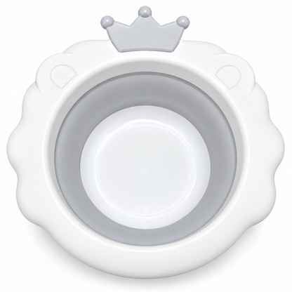 A white and gray collapsible baby bowl with a crown-shaped rim detail, shown on a clean white background.