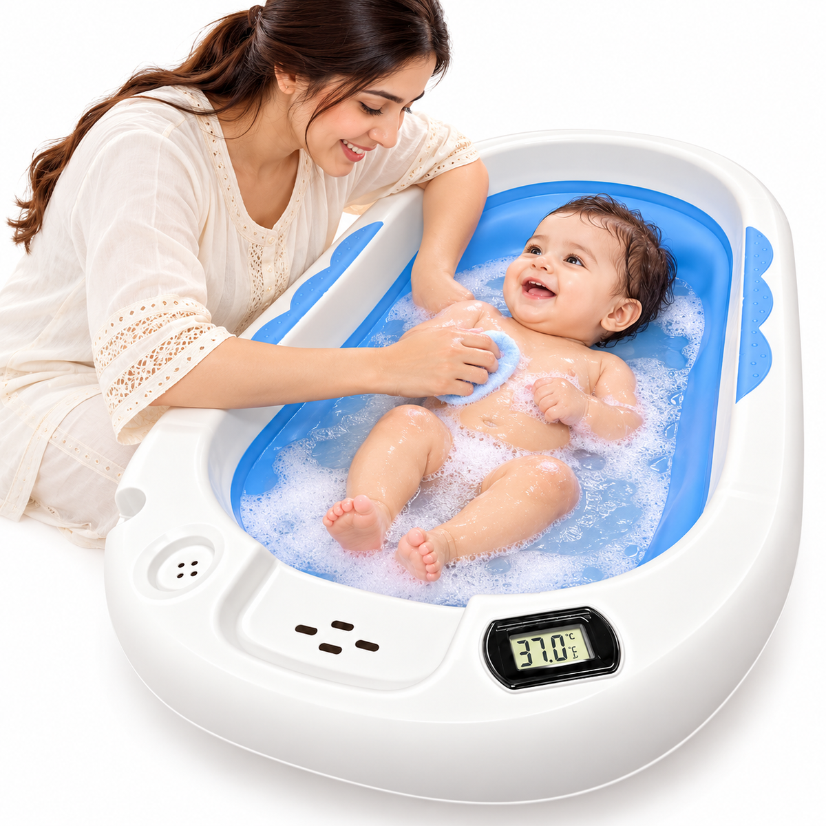 A baby sits in a blue and white inflatable bath tub filled with water and foam while a woman washes the baby. The tub has a small digital temperature display showing 37.